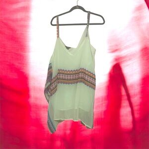 Cream sleeveless tunic with floral designs